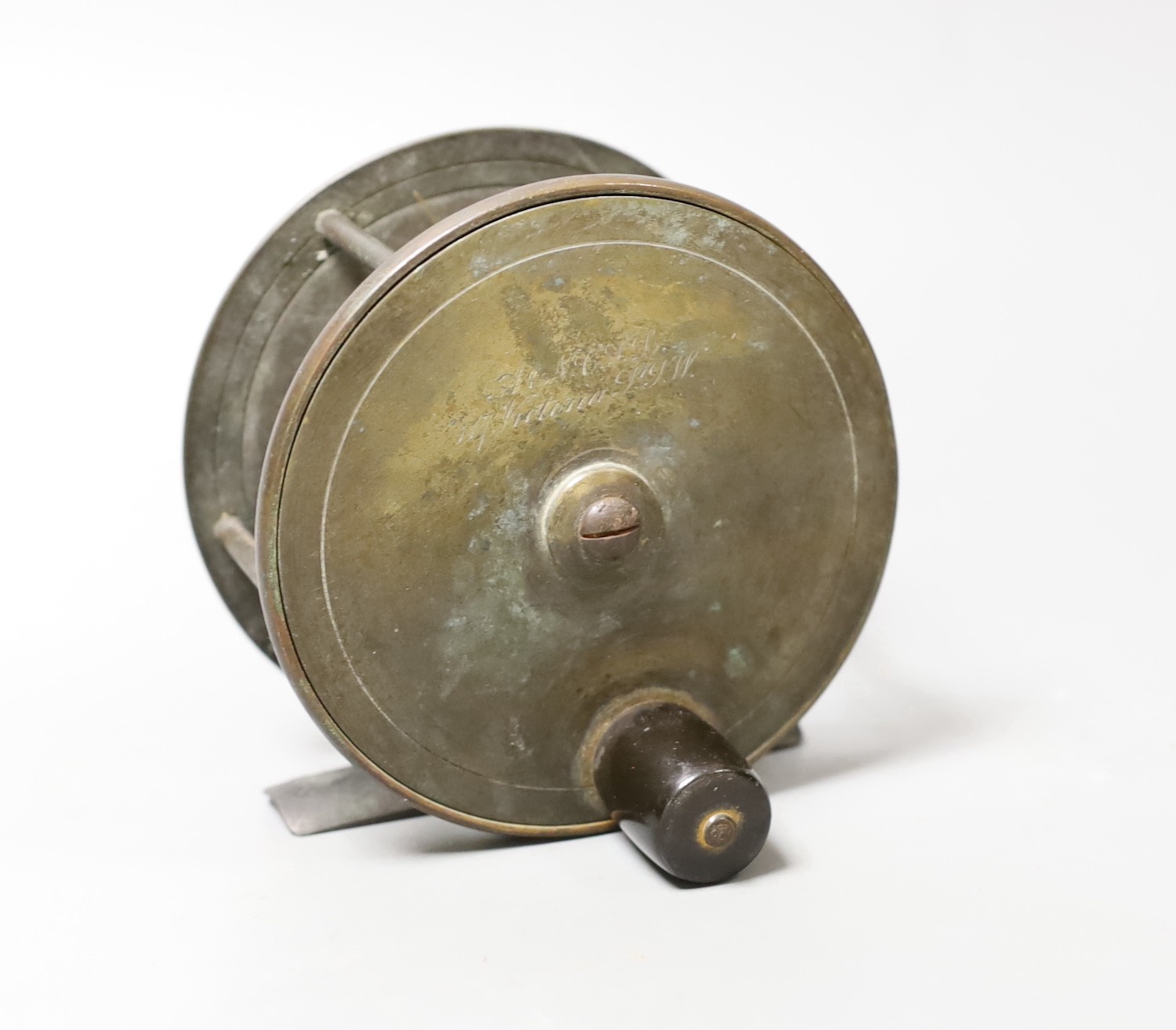 A vintage fishing reel, marked ‘A H N.C.S.L 117 Victoria S.S.W’